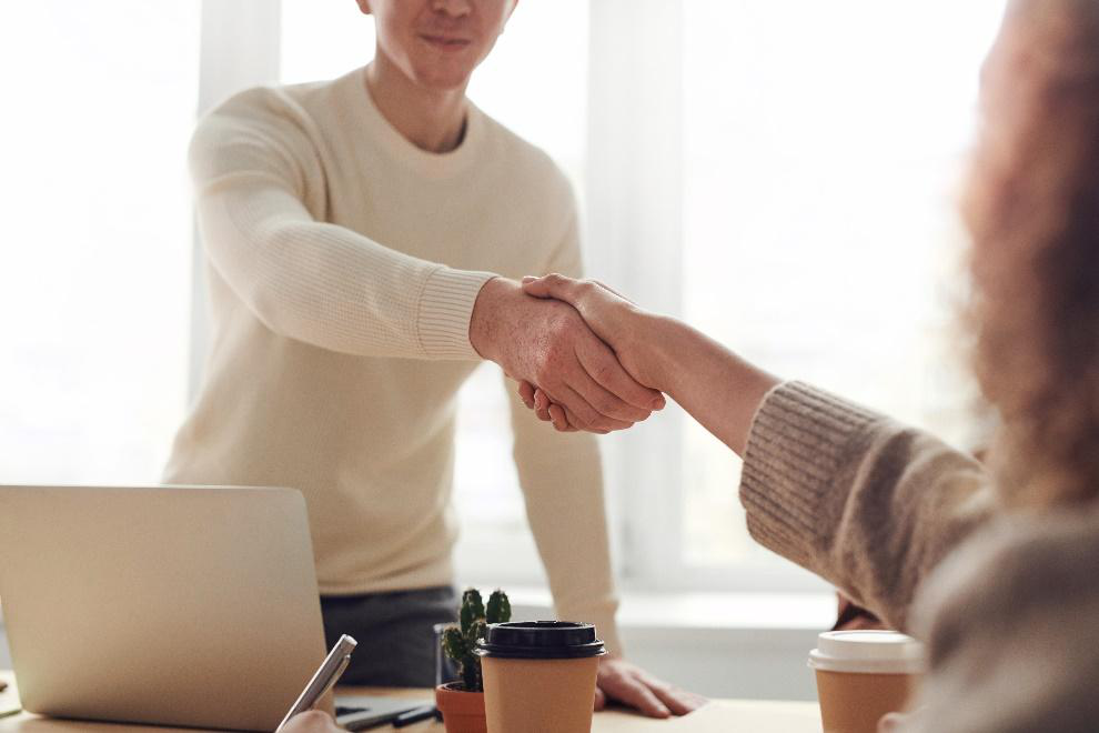 Two people shaking hands 