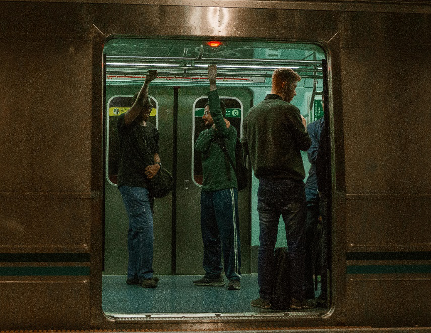 People commuting by train