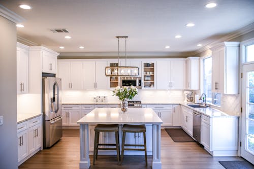 A pristine kitchen interior with natural light.